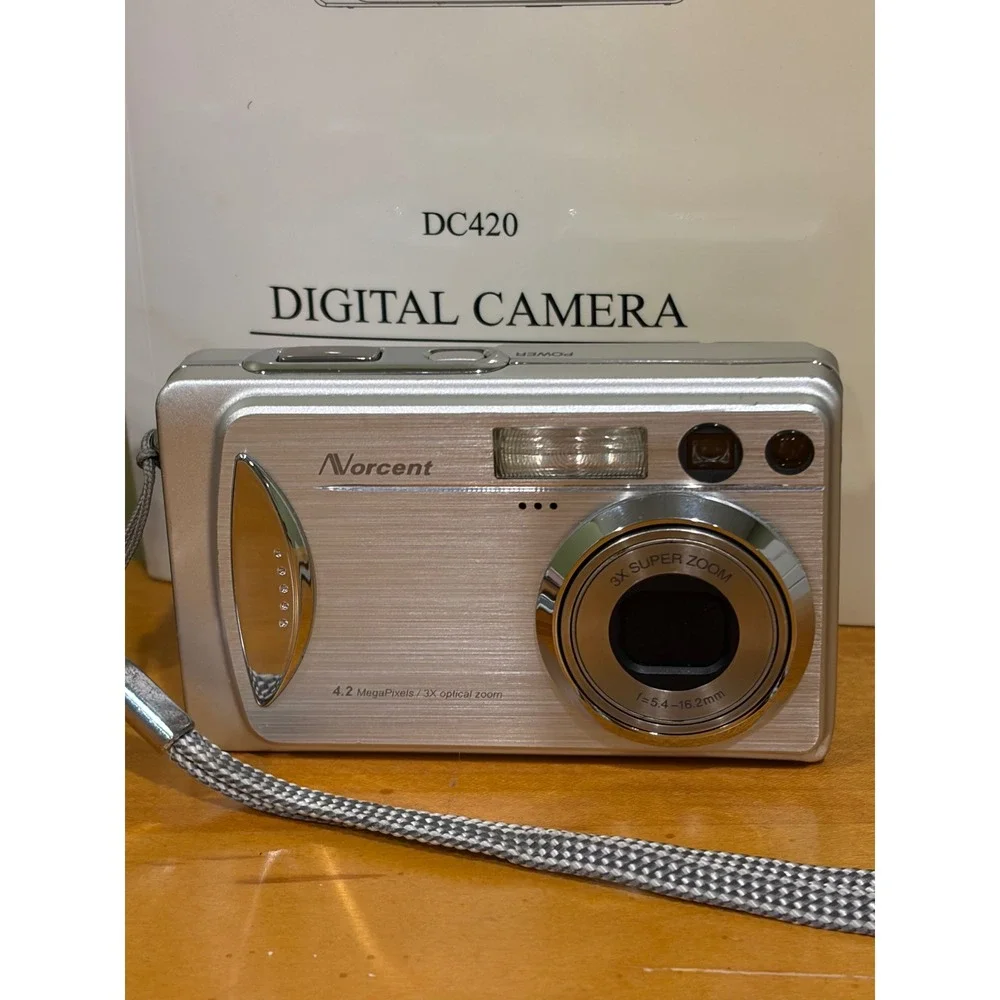 Norcent DC420 Digital Camera Silver 4.2MP 3x Optical Zoom Bundle with Charger